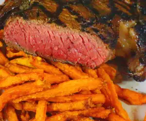 Grilled steak and sweet potato fries. 