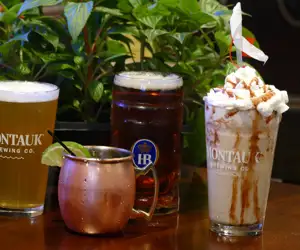 Assorted beverages including moscow mule and draft beers. 