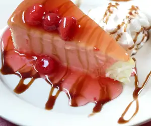 Cheesecake with strawberry topping. 
