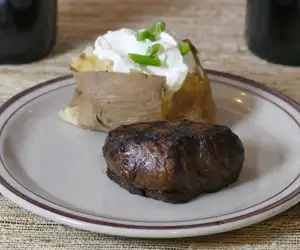 Steak and baked potato. 
